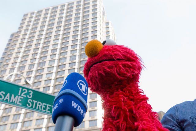 Elmo meets the press